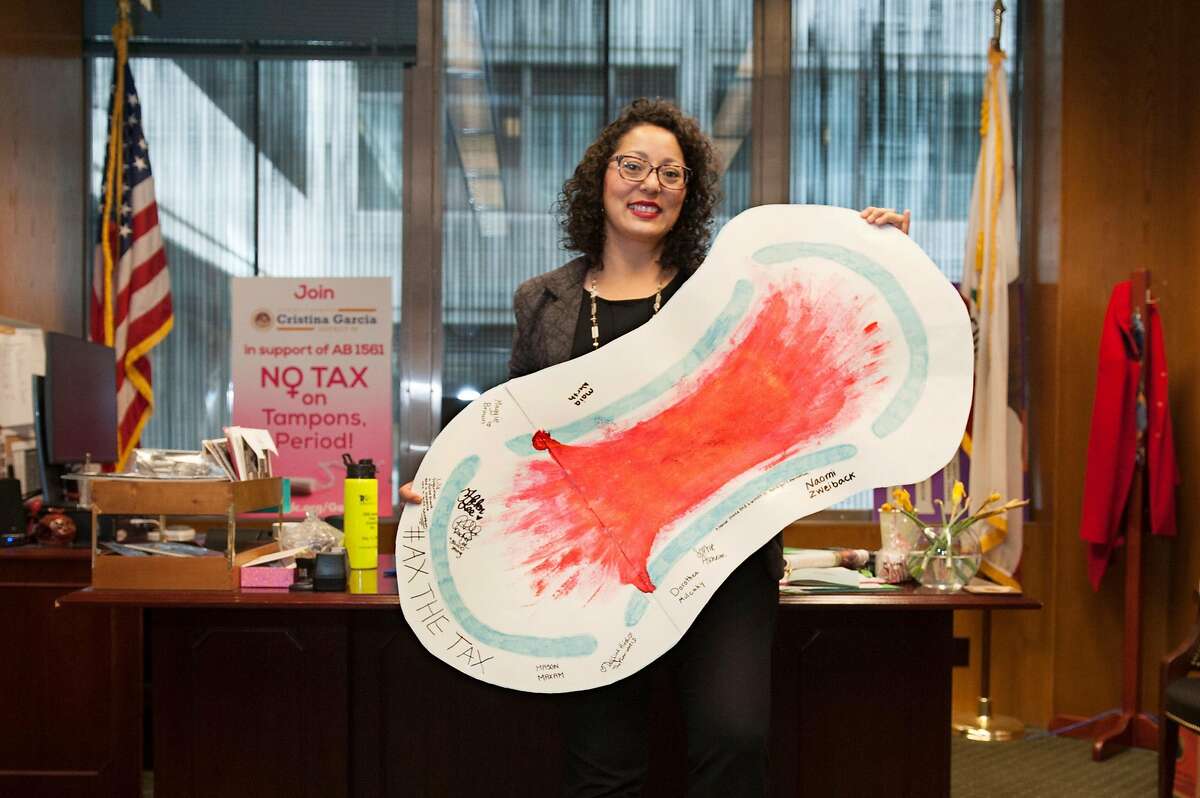 Assemblywoman Cristina Garcia poster of a sanitary napkin she keeps taped to the window of her office that faces toward other elected officials and the governor's office. Garcia authored AB1561 to repeal the sales tax for items like tampons and sanitary napkins. It has failed to pass three times. She is hoping this time it will pass. Photo taken on Thursday, March 21, 2019.