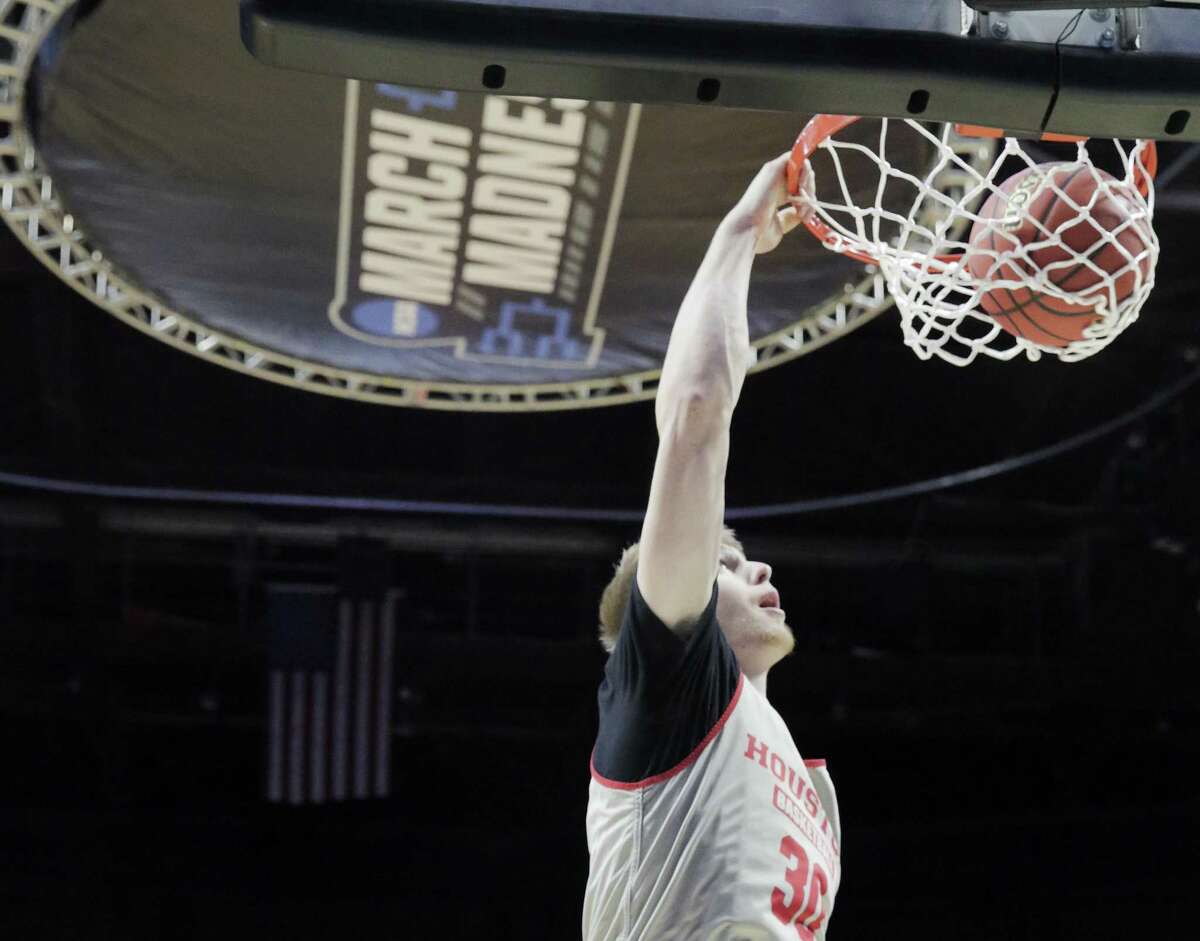 Houston Cougars center Caleb Broodo (30) dunks the ball during practice at BOK Center on Thursday, March 21, 2019 in Tulsa. The Cougars are taking on Georgia State University Panthers in the first round of NCAA Men's Tournament.