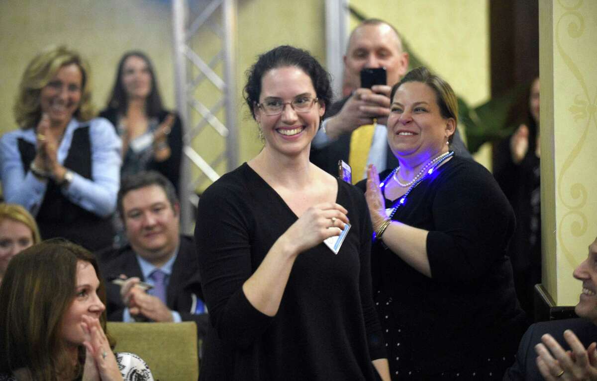 Janell Iver, a Stamford High School teacher, reacts after being honored with the 2019 Educator of the Year award by Stamford Public Education Foundationduring a ceremony at the Stamford Sheraton Hotel on March 21 in Stamford. Katelyn Tavolacci, a Julia A. Stark Elementary School fifth-grade teacher, was also recognized during the ceremony as the Stamford Public Schools Teacher of the Year.