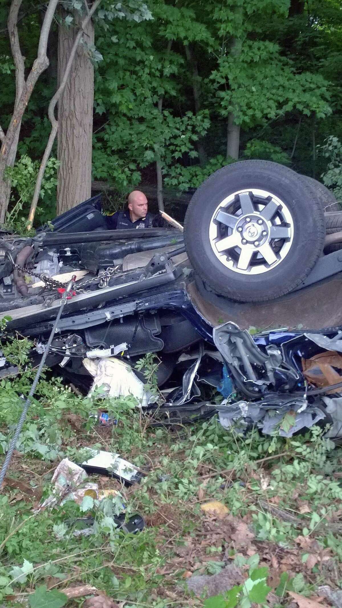 A file photo of a vehicle involved in a fatal crash and rollover on Route 8 in Bridgeport in June 2018, following a pursuit with police.