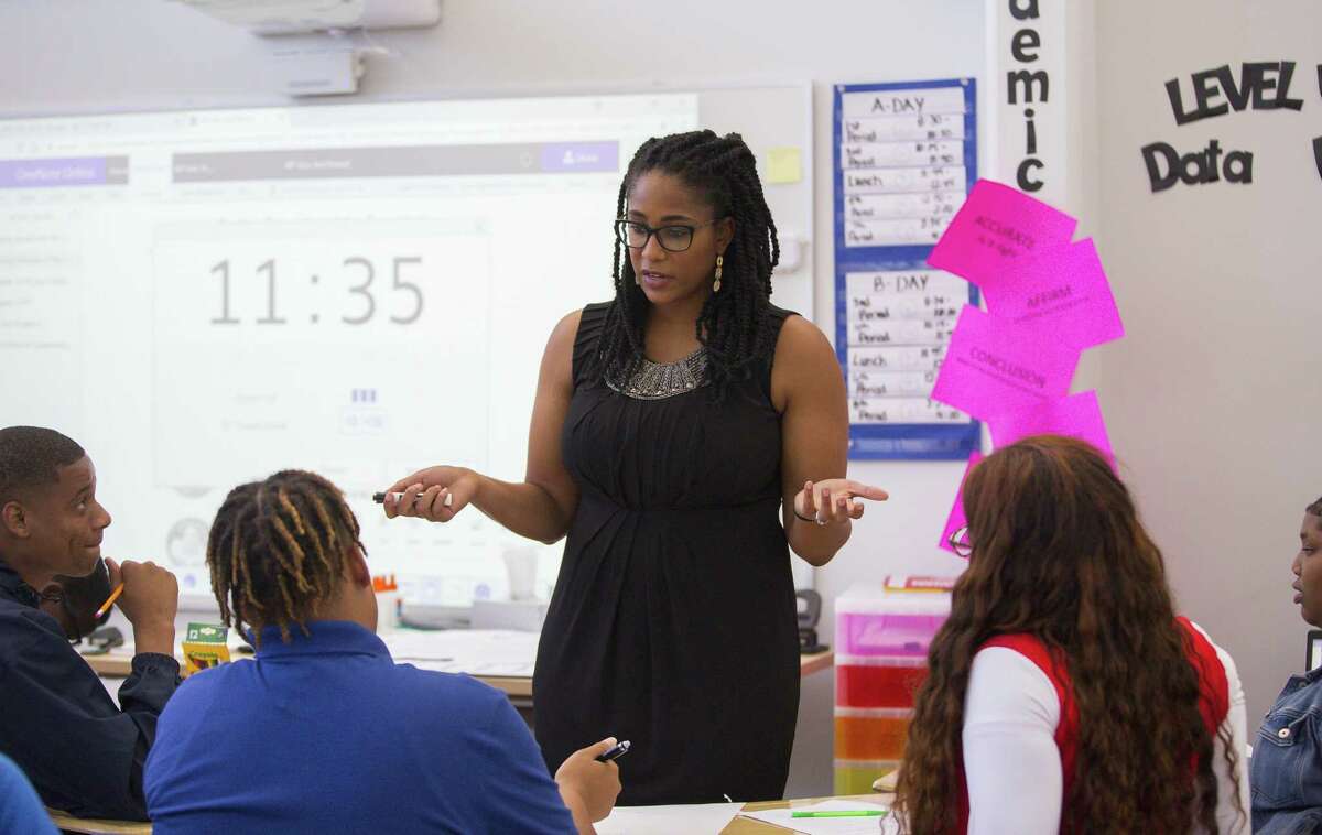 In this September 2018 file photo, Jennifer Charles teaches in her new classroom at Houston ISD’s Booker T. Washington High School, Wednesday, Sept. 19, 2018 in Houston. Washington High School and several other HISD campuses under the district’s $16-million school improvement plan, known as Achieve 180, still struggled academically despite added investments.