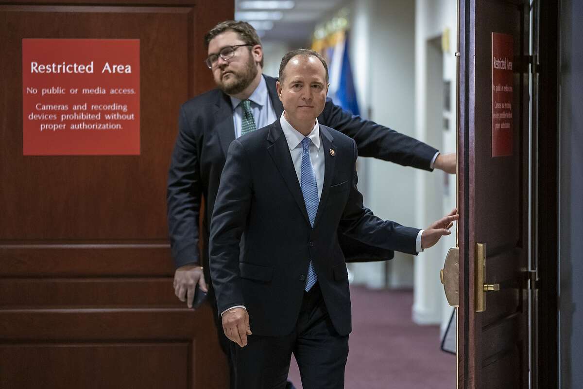 Rep. Adam Schiff, chairman of the House Intelligence Committee, arrives to talk briefly to reporters after testimony by Michael Cohen, President Donald Trump's former lawyer, at the Capitol in Washington, Wednesday, March 6, 2019. Schiff said Cohen was "fully cooperative" and "answered every question put to him by members of both parties." (AP Photo/J. Scott Applewhite)