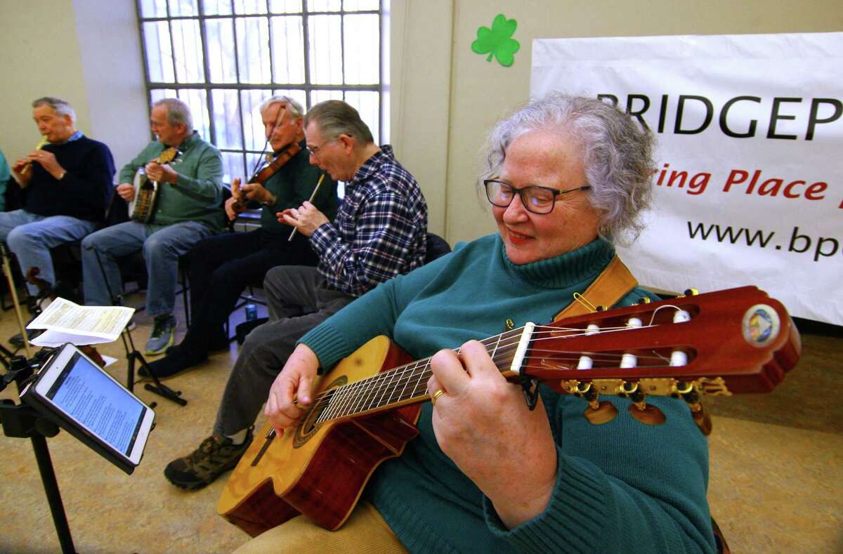 Mary Ellen Lyons performs during a concert by The Shamrogues at the Bridgeport Public Library in Bridgeport, Conn., on Saturday, Mar. 23, 2019. The band entertained the audience with traditional Irish songs, jigs and reels. They all played on traditional instruments like the fiddle, tin whistle and mandolin among others. The band, which is known as the largest Irish band in Connecticut, practices every Monday at 8 p.m. at the Gaelic-American Club in Fairfield.
