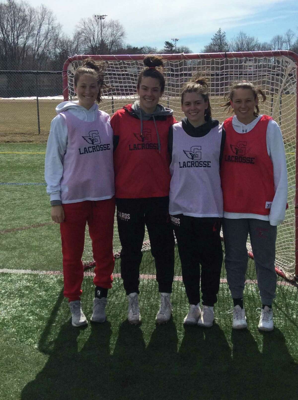 From left, Grace Fahey, Olivia Hoekman, Sloane Loveless and Paige Finneran are senior captains of the Greenwich High School girls lacrosse team.