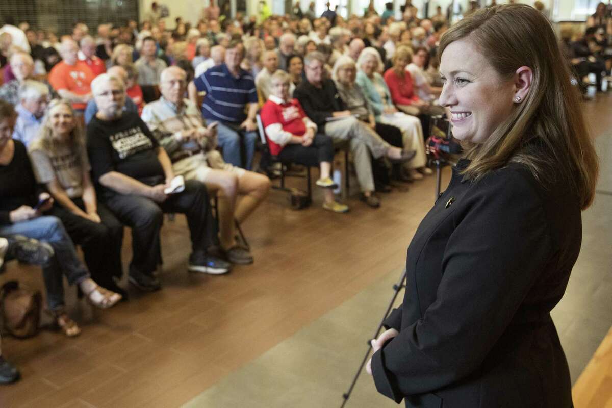 Rep. Lizzie Fletcher, D-Texas, pauses before speaking to her constituents of the 7th Congressional District during a town hall meeting at Frostwood Elementary School on Saturday, March 23, 2019, in Houston.