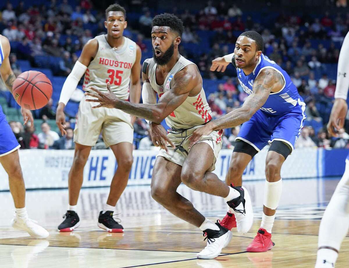 UH guard Corey Davis Jr., center, will be leaned upon heavily when the Cougars face Kentucky in a Sweet 16 matchup Friday night in Kansas City.