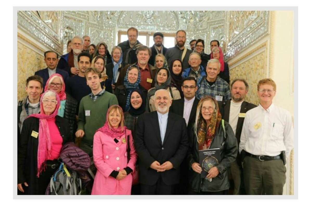 The Pink Code group visited Iran recently. Bill Collins is wearing a grey baseball cap that reads Veterans for Peace.