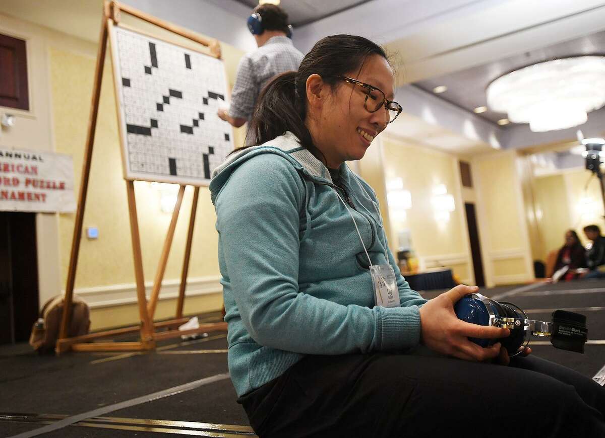 Lily Geller, of Brooklyn, NY, smiles as she awaits the announcement of her victory in the C division at the 42nd Annual American Crossword Puzzle Tournament at the Stamford Marriott in Stamford, Conn. on Sunday, March 24, 2019.