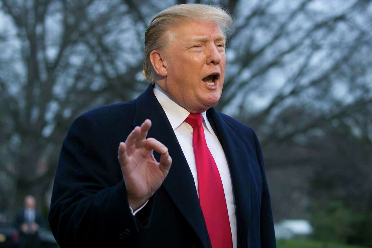 President Donald Trump speaks with the media after stepping off Marine One on the South Lawn of the White House, Sunday, March 24, 2019, in Washington. The Justice Department said Sunday that special counsel Robert Mueller's investigation did not find evidence that President Donald Trump's campaign "conspired or coordinated" with Russia to influence the 2016 presidential election. (AP Photo/Alex Brandon)