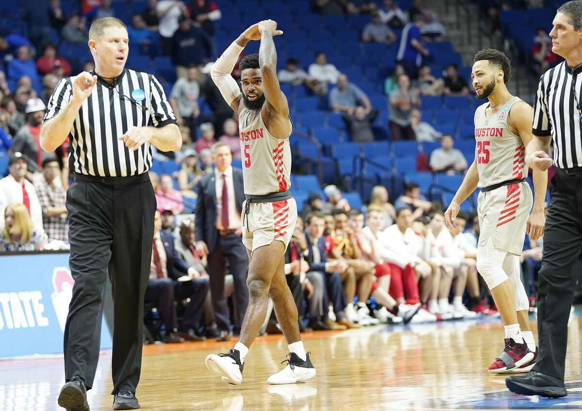Houston Cougars guard Corey Davis Jr. (5) tries to fire up the crowd in the final seconds of the second round of NCAA playoffs at BOK Center in Tulsa on Sunday, March 24, 2019. Houston won the game 74-59 and are heading to the Sweet 16.