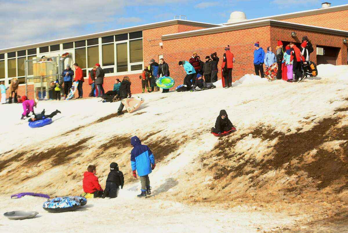 The sled hill looks the worse for wear after a busy day of sledding at Jonathan Law High School in Milford, Conn. on Monday, March 4, 2019.