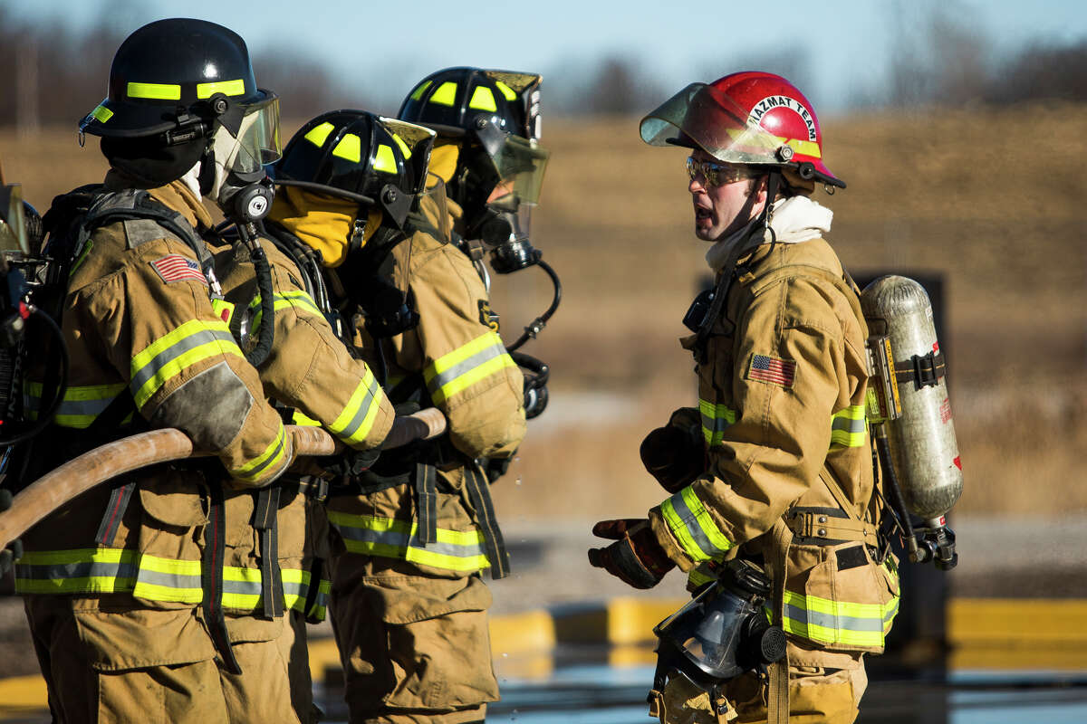 Future firefighters gain experience during a training exercise hosted by Hemlock Semiconductor on Monday, March 25, 2019 at HSC's live fire training facility. (Katy Kildee/kkildee@mdn.net)