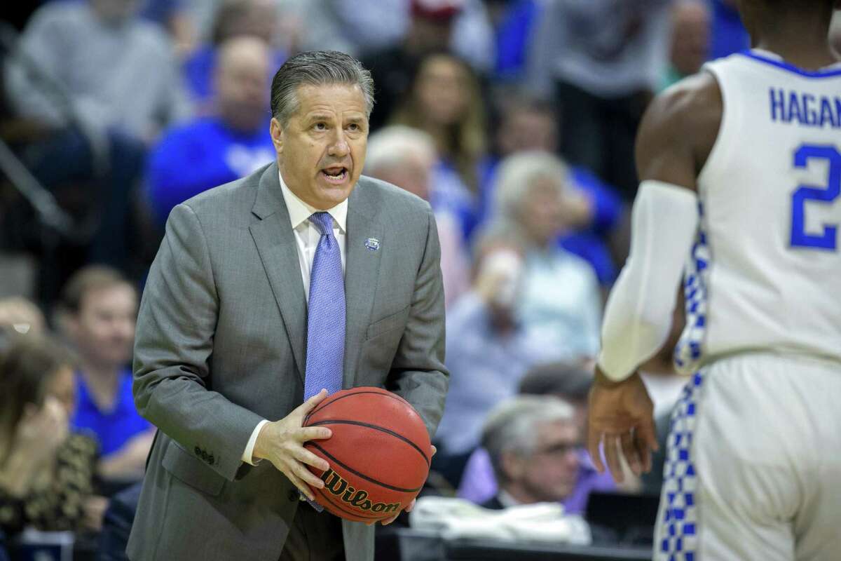UHKentucky pits opposites in Kelvin Sampson, John Calipari