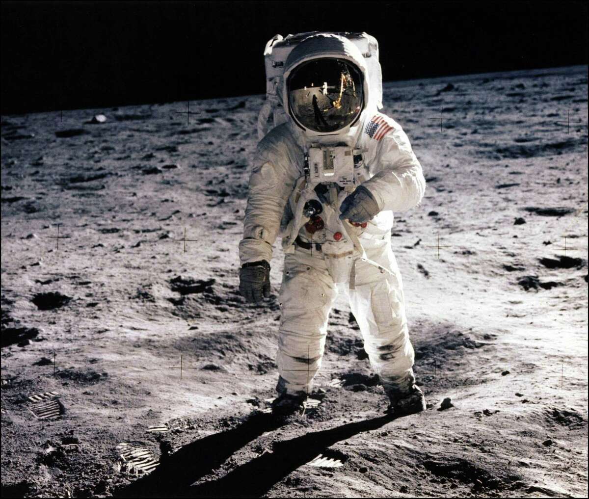This July 20, 1969, photo shows astronaut Edwin E. Aldrin Jr. walking on the surface of the moon near the leg of the Lunar Module (ML) "Eagle" during the Apollo 11 extravehicular activity (EVA). AFP PHOTO / NASA/HANDOUT