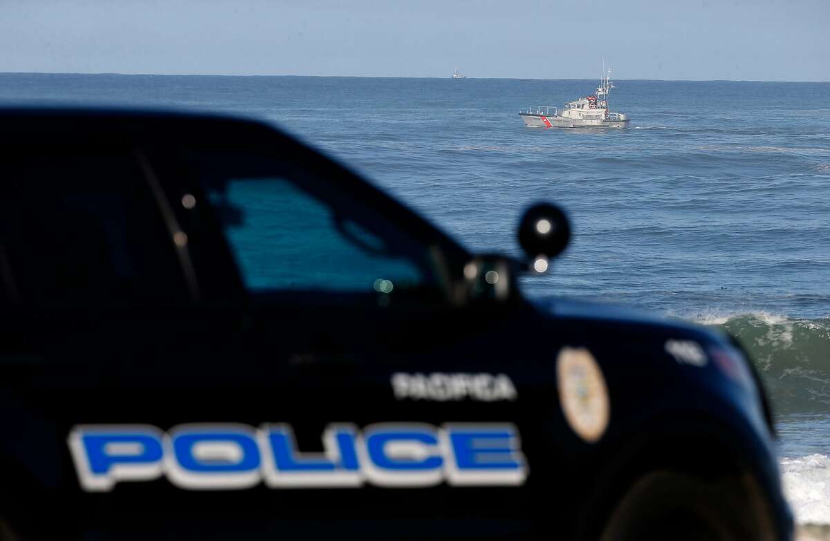 A Coast Guard boat searches the ocean for a swimmer who was reported missing in the early morning hours off Rockaway Beach in Pacifica, Calif. on Tuesday, March 26, 2019.