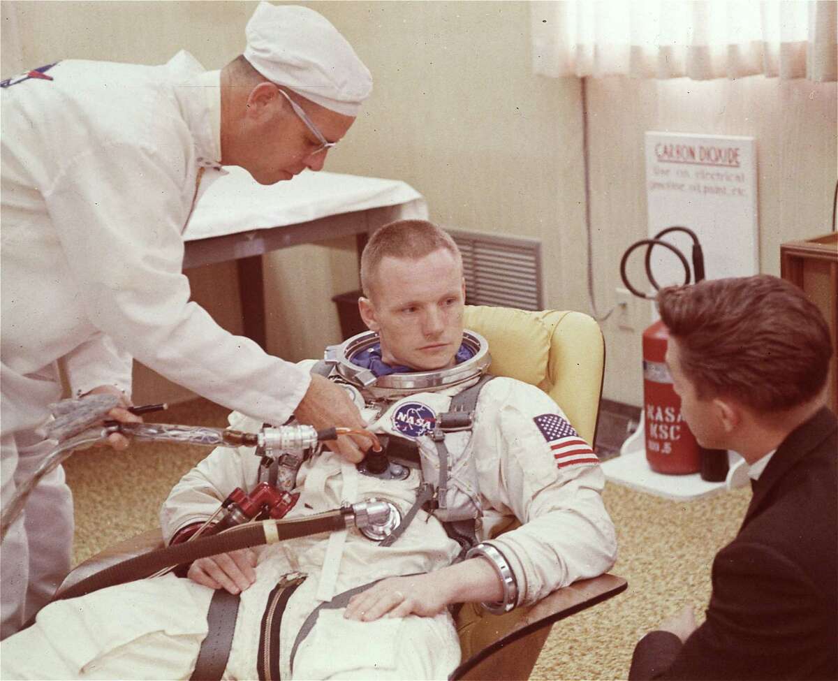Neil Armstrong is seated during a suiting up exerciseon March 9, 1966, in Cape Kennedy, Fla., in preparation for the Gemini 8 flight.