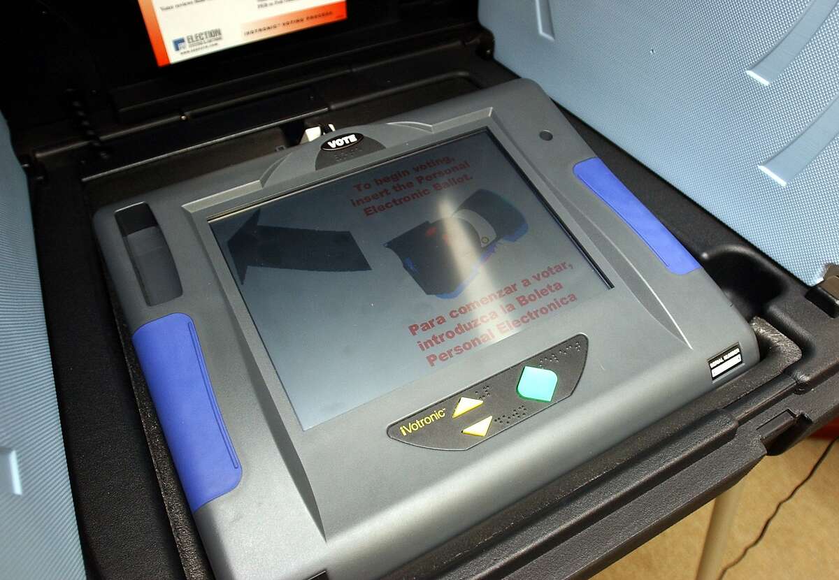 METRO -The Votronic electronic voting machine, which weighs about nine pounds, is being considered for use in Bexar County. This one was on display at the Bexar County Courthouse on Tuesday afteroon. BILLY CALZADA / STAFF