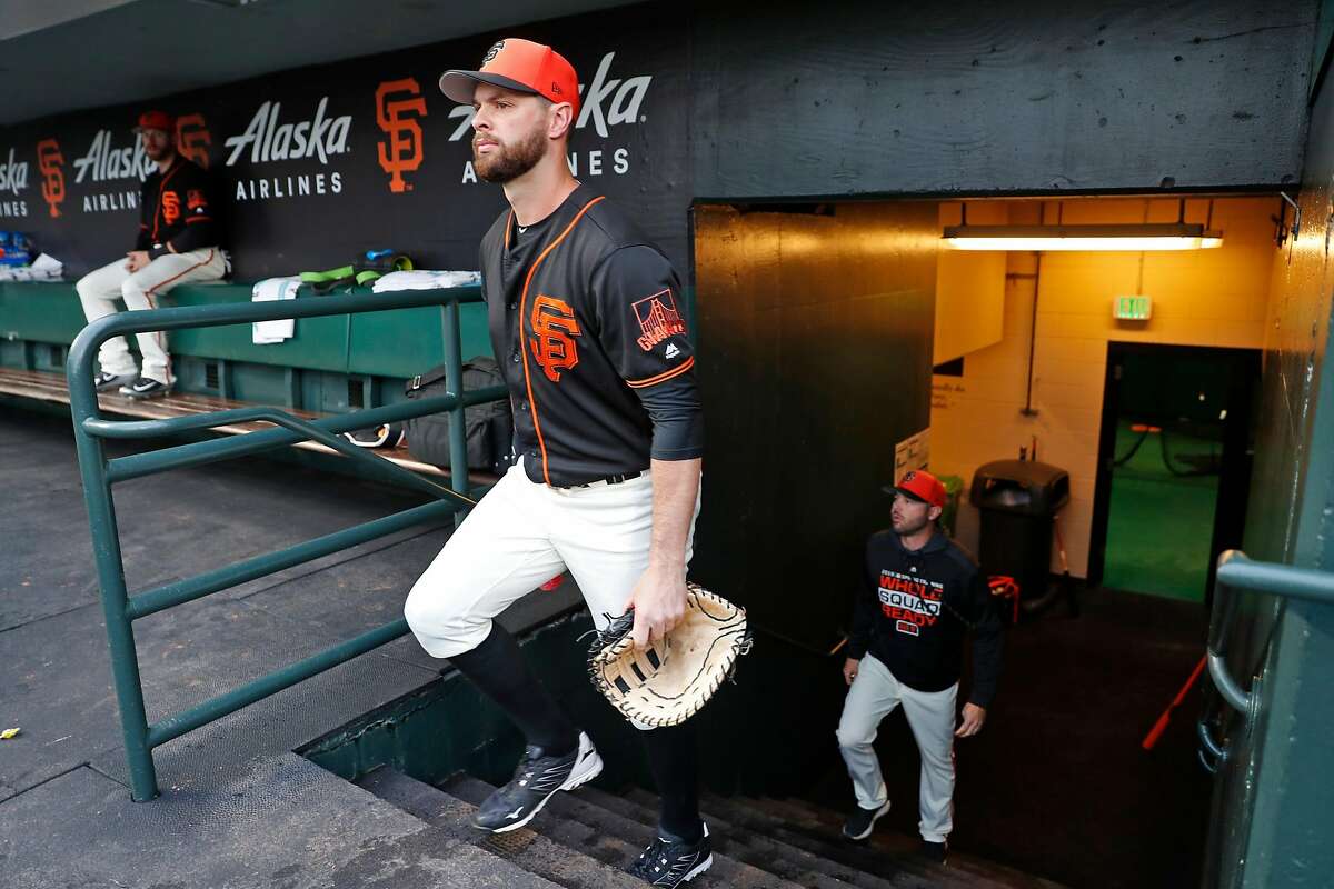San Francisco Giants' Brandon Belt walks up from the clubhouse before Giants play Oakland Athletics in Bay Bridge Series at Oracle Park in San Francisco, Calif., on Tuesday, March 26, 2019.