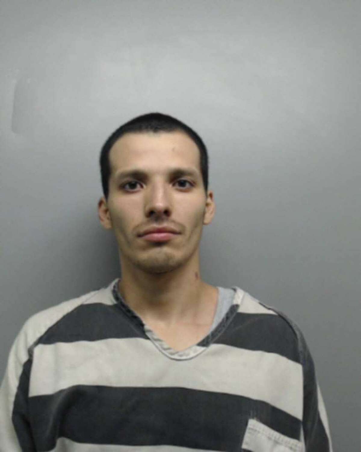Gerardo Javier Fernandez, 27, was sentenced after pleading guilty to aggravated robbery and his participation in a Webb County Jail riot allegedly caused by Texas Mexican Mafia gang members.