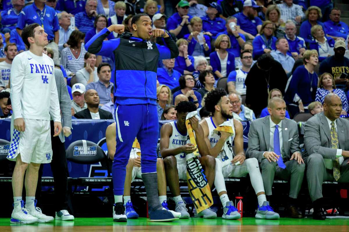 PHOTOS: Cougars depart for Midwest Region semifinals  Kentucky forward PJ Washington, center, celebrates from the bench with a cast boot on his leg during the second half of the second round men's college basketball game against Wofford in the NCAA Tournament, in Jacksonville, Fla. Saturday, March 23, 2019. (AP Photo/Stephen B. Morton)  >>>See photos from the team's departure for Kansas City, Mo., where they Cougars will face Kentucky in the Sweet 16 ... 