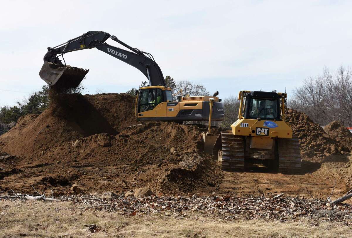 Construction work for a new Hyatt House hotel and Longhorn Steakhouse commences on the former Lazare auto dealership property on Wednesday, March 27, 2019, on Wolf Road in Colonie, N.Y. (Will Waldron/Times Union)