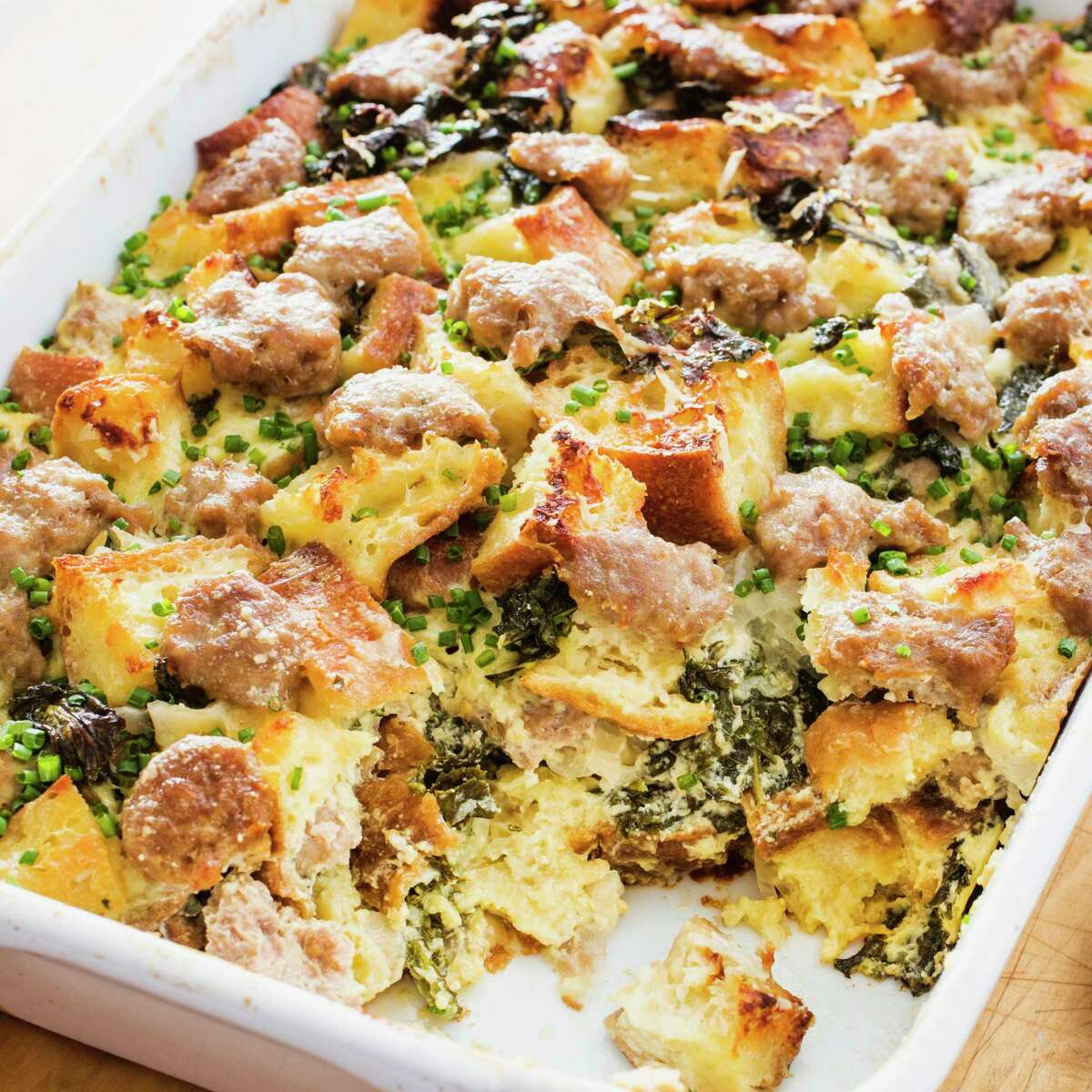 Savory Bread Pudding in Brookline, Mass. This recipe appears in the cookbook "All-Time Best Brunch." (Daniel J. van Ackere/America's Test Kitchen via AP)