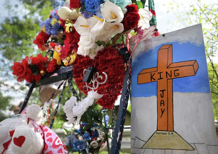 A shrine to 8-month-old King Jay Davila is maintained near the field where police found his body, placed in a backpack and buried. Photo: Bob Owen / ©2019 San Antonio Express-News