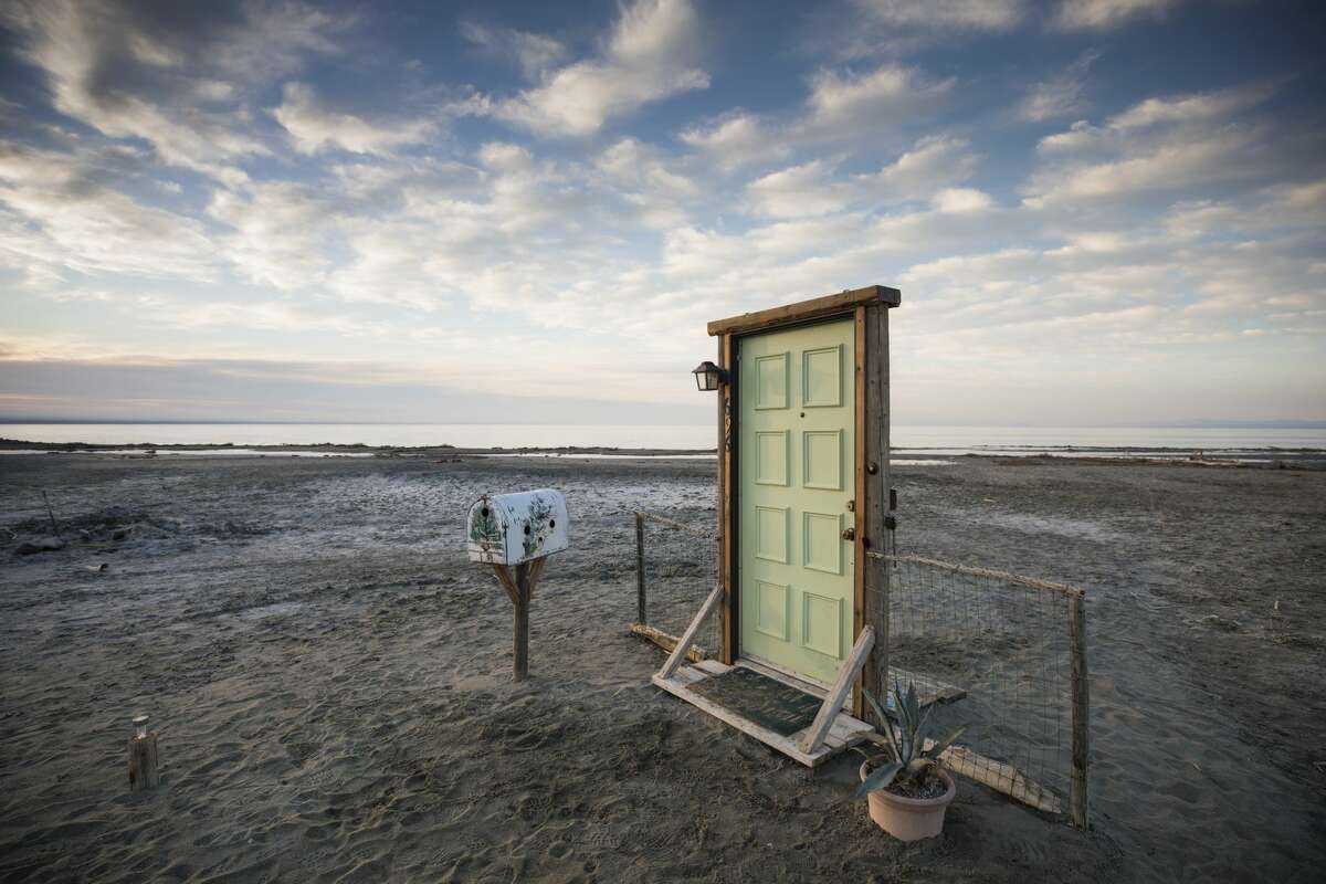 "The Open House," an installation by Keith Jones and Lee Henderson, features a front door that opens to the expansive Salton Sea.