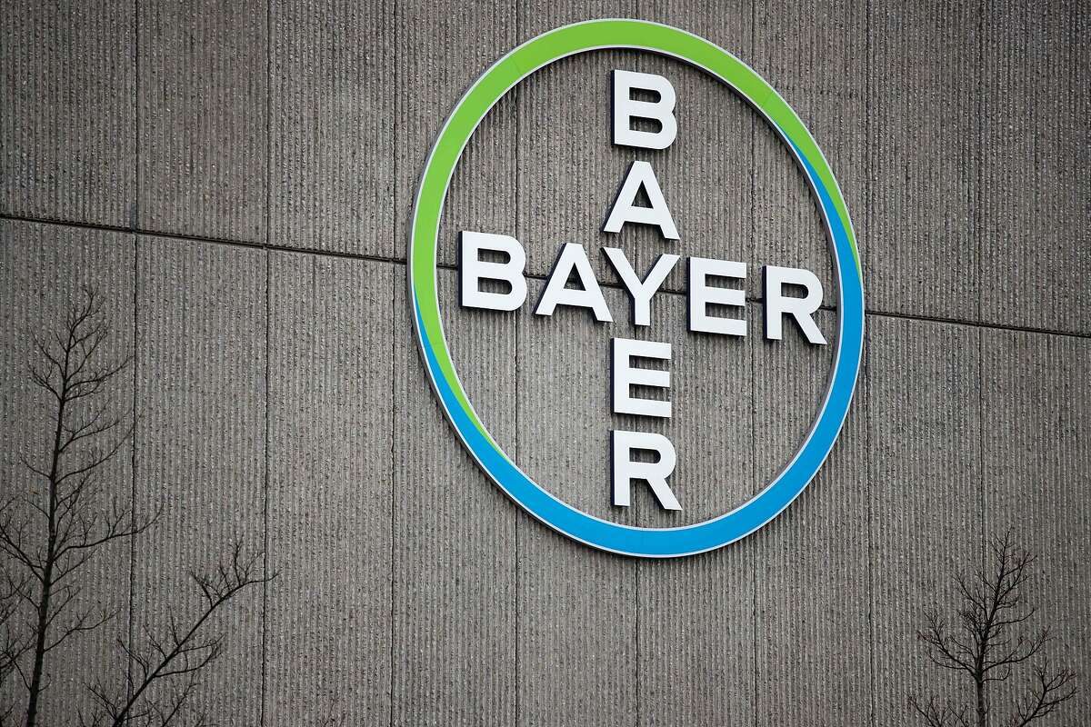 (FILES) In this file photo taken on March 20, 2019 shows the logo of German chemicals and pharmaceuticals giant Bayer on a wall at the group's coumpound in Berlin. - Monsanto was ordered on March 27, 2019 to pay some $81 million to an American retiree who blames his cancer on the agribusiness giant's weedkiller Roundup. A San Francisco jury found the firm had been "negligent by not using reasonable care" to warn of the risks of its product, ordering it to pay Edwin Hardeman $75 million in punitive damages, $5.6 million in compensation and $200,000 for medical expenses. The same jury previously found that a quarter century exposure to Roundup, whose principal ingredient is controversial chemical glyphosate, was a "substantial factor" in giving the 70-year-old Hardeman non-Hodgkin's lymphoma. (Photo by Odd ANDERSEN / AFP)ODD ANDERSEN/AFP/Getty Images