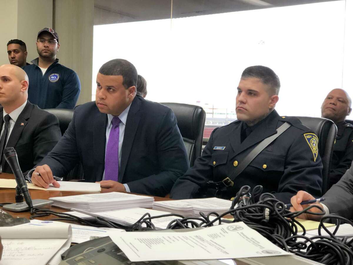 The Board of Police Commissioners tabled a hearing on whether to fire New Haven police Officer Jason Bandy over his facial tattoos.