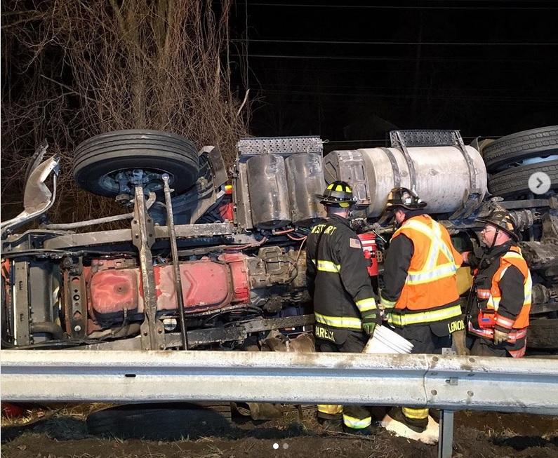 Firefighters free trapped driver from overturned truck on I-95