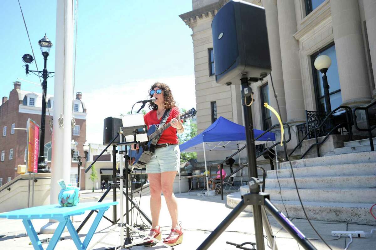 Musician nelson AKA Julia Maimon performs in front of Old Town Hall during the Make Music Day event in downtown Stamford in 2018. Musicians are being sought for this year’s edition, which takes place Friday, June 21.