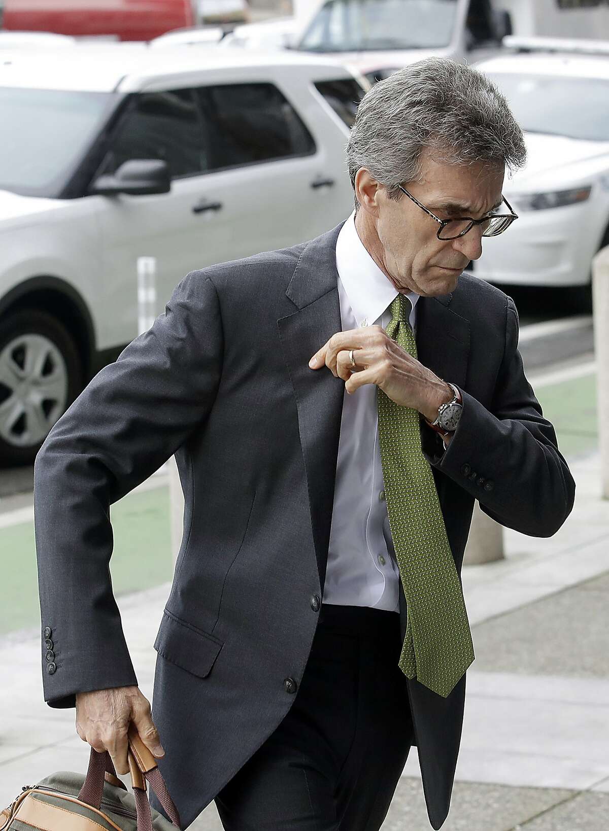 Attorney Stephen Karotkin, representing Pacific Gas & Electric Corp., arrives at a Federal Courthouse in San Francisco, Tuesday, Jan. 29, 2019. Faced with potentially ruinous lawsuits over California's recent wildfires, Pacific Gas & Electric Corp. filed for bankruptcy protection Tuesday in a move that could lead to higher bills for customers of the nation's biggest utility and reduce the size of any payouts to fire victims.