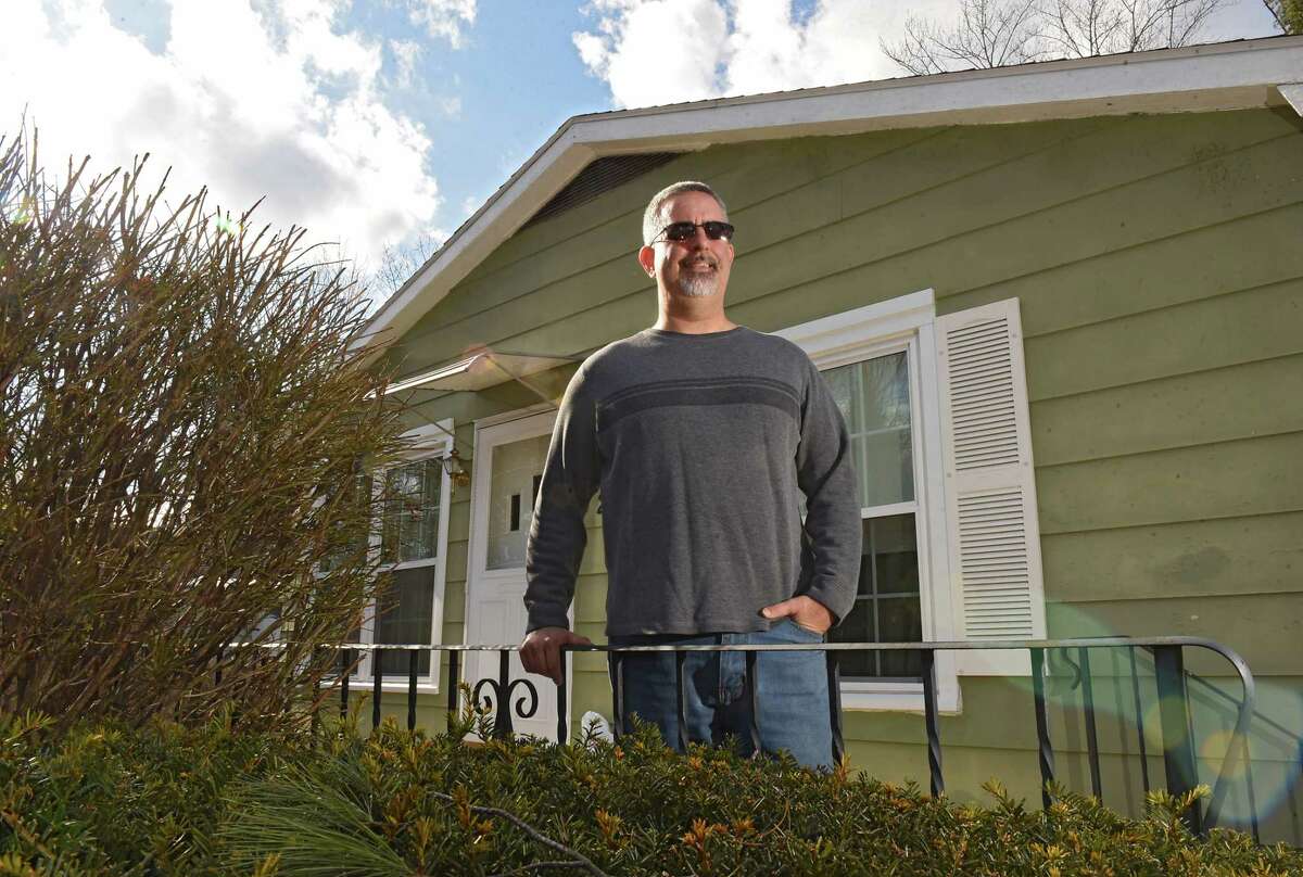 William Day stands in front of his home on Tuesday, March 19, 2019 in Colonie, N.Y. Day used a benefit in his GI Bill to get a home loan. (Lori Van Buren/Times Union)