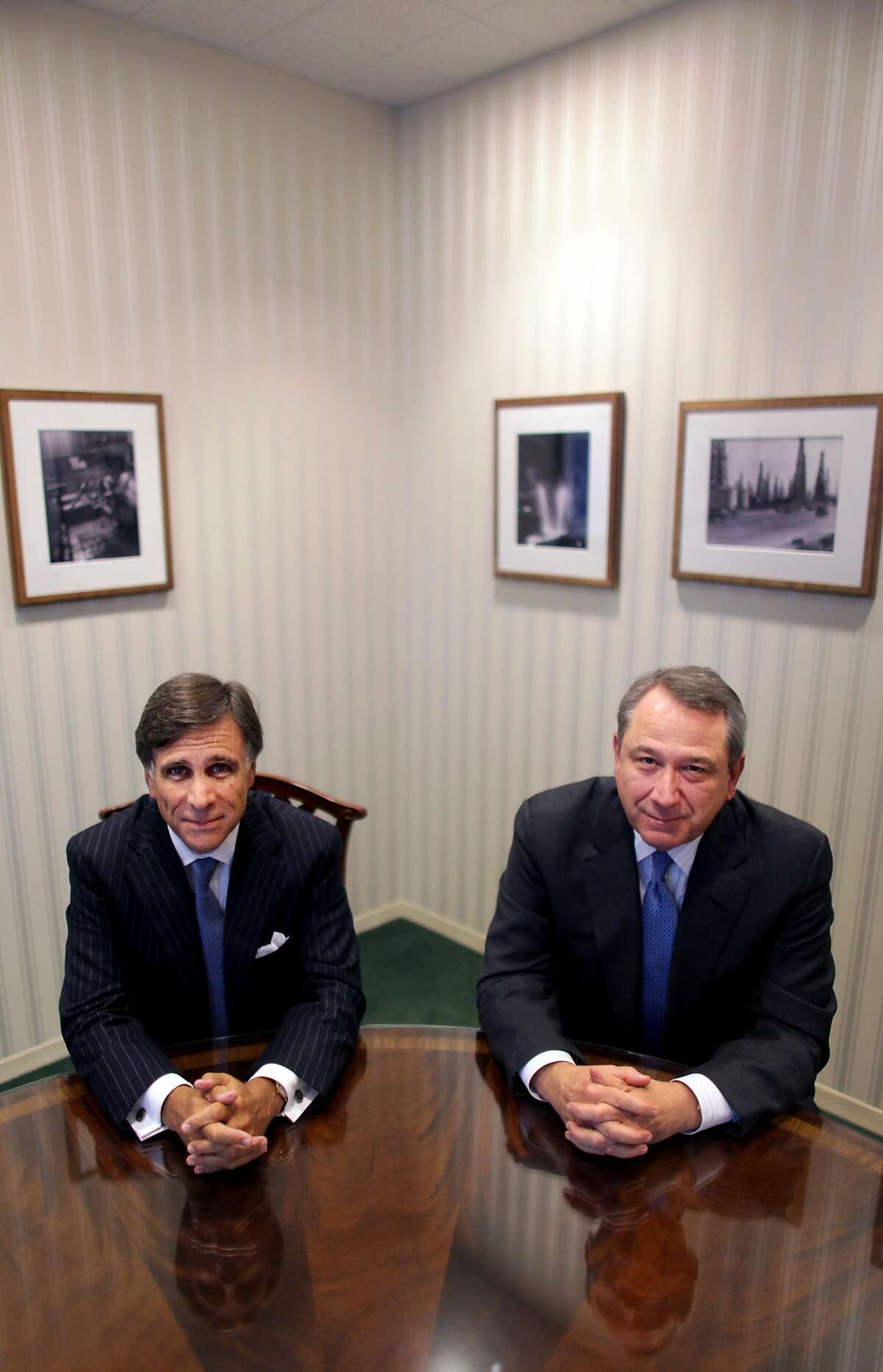 Evan Chesler, left, and Allen Parker, partners at the law firm Cravath, Swaine & Moore, in New York, Sept. 13, 2012. Faced with risk-taking peers and an uncertain economy, a handful of prestigious law firms, including Cravath, stick with partnership-driven philosophies that emphasize teamwork and a strict lock-step compensation system.