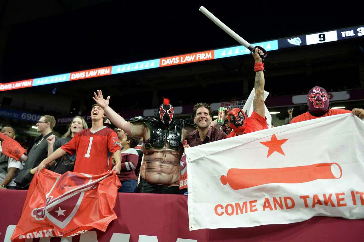 San Antonio Commanders fans celebrate a win during AAF game against Salt Lake Stallions on March 17, 2019 at the Alamodome.