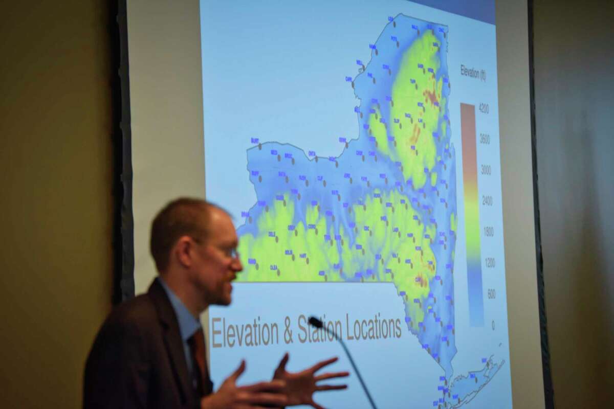 Jerry Brotzge, project director of the NYS Mesonet at the University at Albany, talks about the Mesonet system during a press event on Tuesday, Feb. 5, 2019, in Albany, N.Y. In the background on the screen is an image showing the locations of the measuring stations around the state. (Paul Buckowski/Times Union)