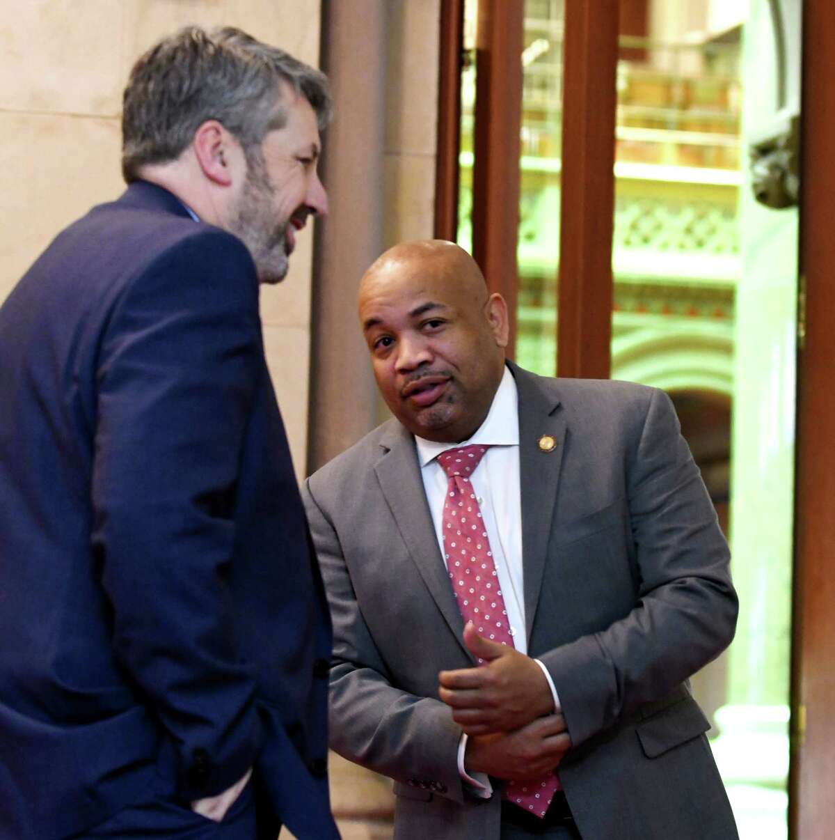 Assembly Speaker Carl Heastie, right, is joined by his communications director Mike whyland, left, while speaking to a reporter outside his Assembly office on Friday, March 29, 2019, at the Capitol in Albany, N.Y. (Will Waldron/Times Union)