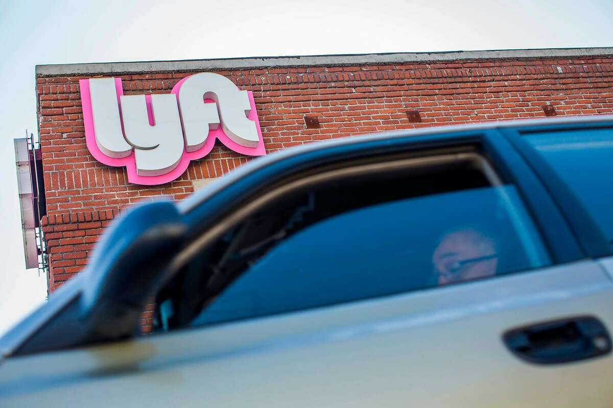 A driver rides his car in front of the Lyft Drivers Hub in Los Angeles, California, March 29, 2019. - Ride-hailing company Lyft made its Initial Public Offering (IPO) on the Nasdaq Stock Market on March 29th. (Photo by Apu Gomes / AFP)APU GOMES/AFP/Getty Images