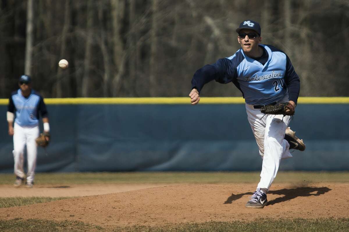 Northwood's Peter Joseph pitches the ball during a doubleheader against Wayne State on Friday, March 29, 2019 at Northwood University. (Katy Kildee/kkildee@mdn.net)