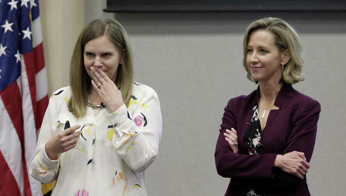 Alissa Parker, left, holds back tears as she and Michele Gay, right, mothers of two of the students killed at the Sand Hook massacre and co-founders of Safe and Sound Schools, deliver the keynote speech at the National Summit on School Safety held at the Region 4 Education Resource Center Friday, Mar. 29, 2019 in Houston, TX.