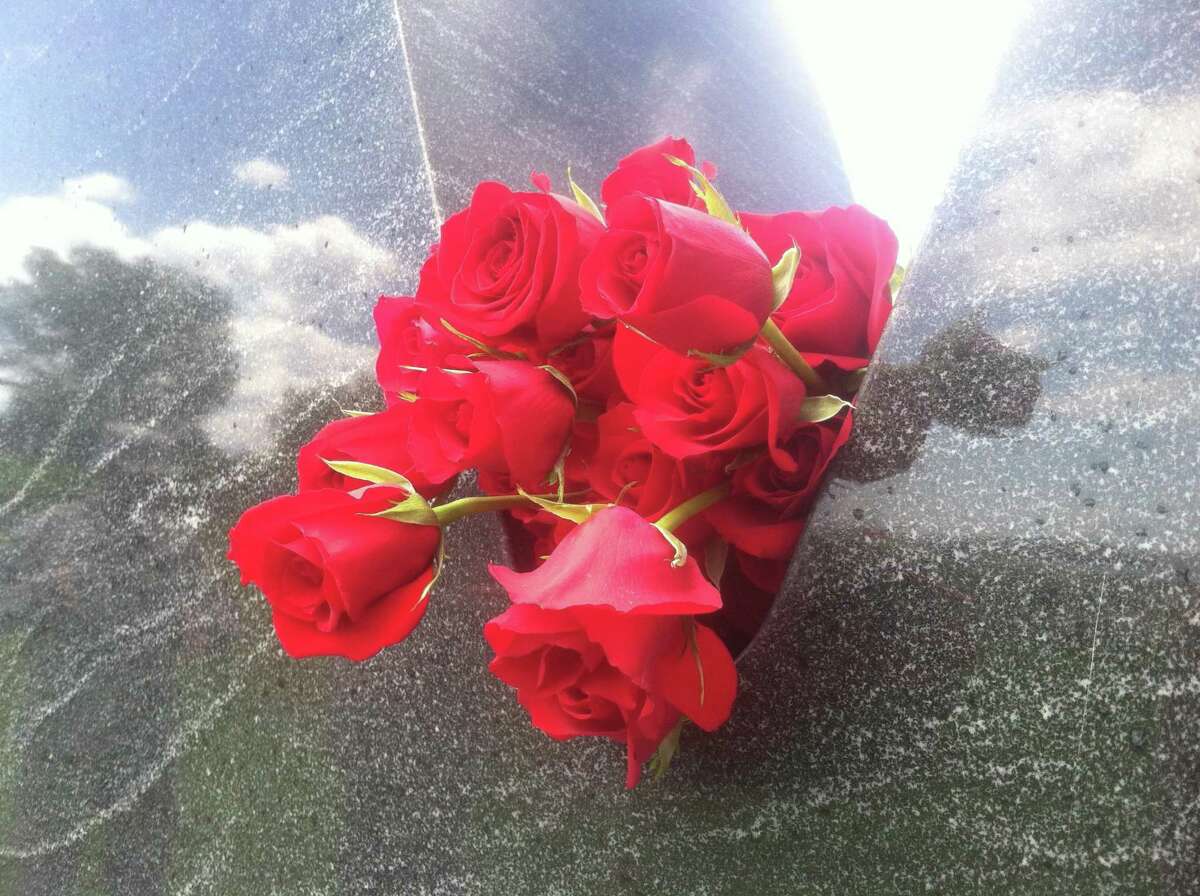 Roses placed on the Vietnam Memorial on Long Wharf in New Haven