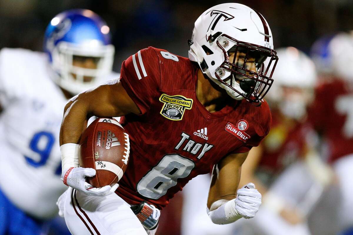 PHOTOS: Everything you need to know about new UH coach Dana Holgorsen  MOBILE, ALABAMA - DECEMBER 22: Marcus Jones #8 of the Troy Trojans runs with the ball during the first half of the Dollar General Bowl against the Buffalo Bulls on December 22, 2018 in Mobile, Alabama. (Photo by Jonathan Bachman/Getty Images) >>>Here's the background on University of Houston's new football coach Dana Holgorsen ... 