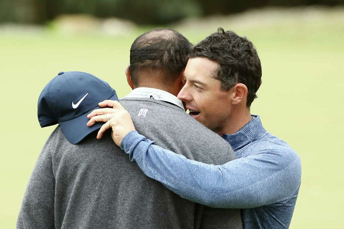 AUSTIN, TEXAS - MARCH 30: Tiger Woods of the United States embraces Rory McIlroy of Northern Ireland after defeating him 2&1 during the fourth round of the World Golf Championships-Dell Technologies Match Play at Austin Country Club on March 30, 2019 in Austin, Texas.