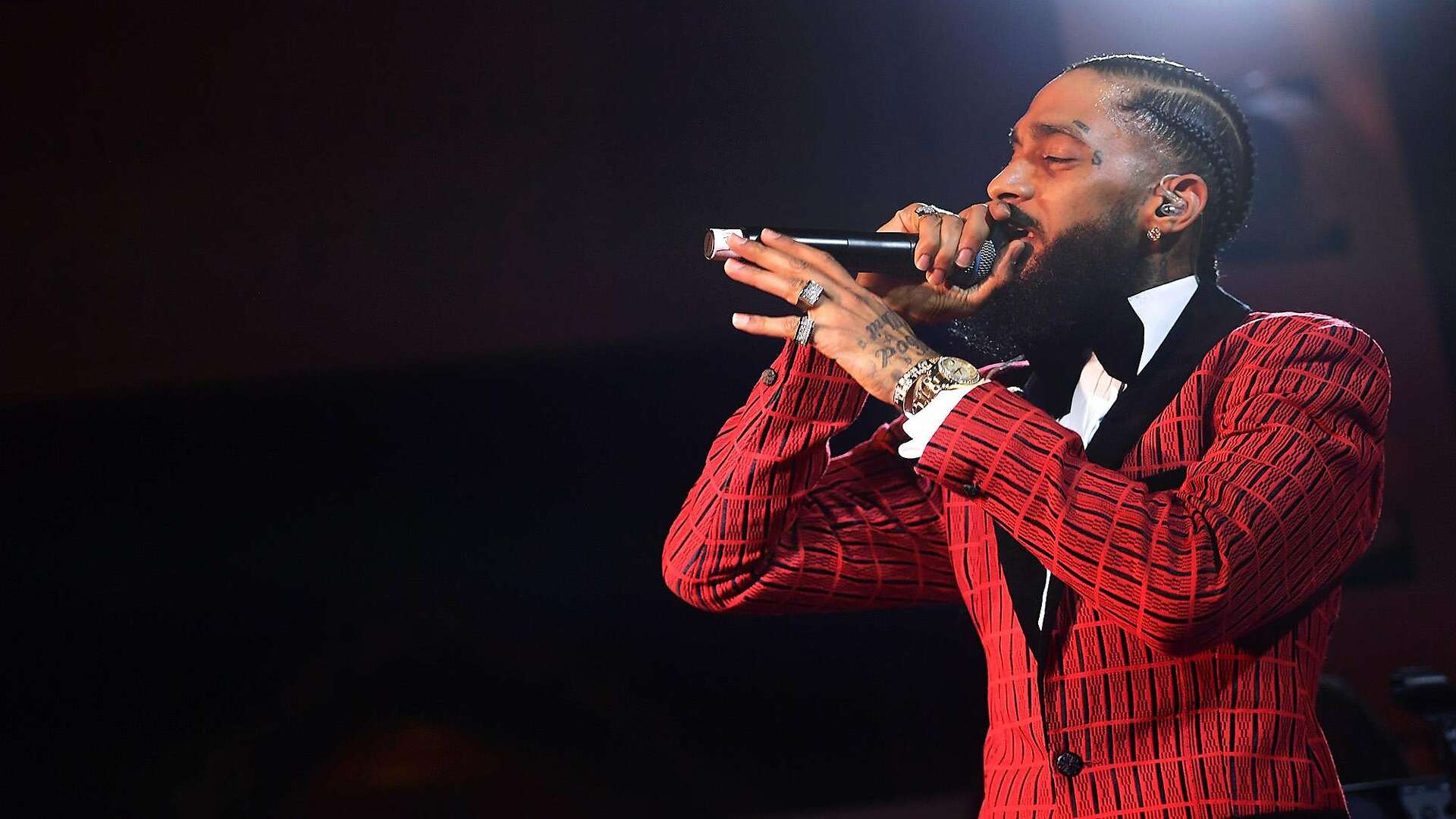 L.A. rapper Nipsey Hussle is dead at 33 after shooting outside his store