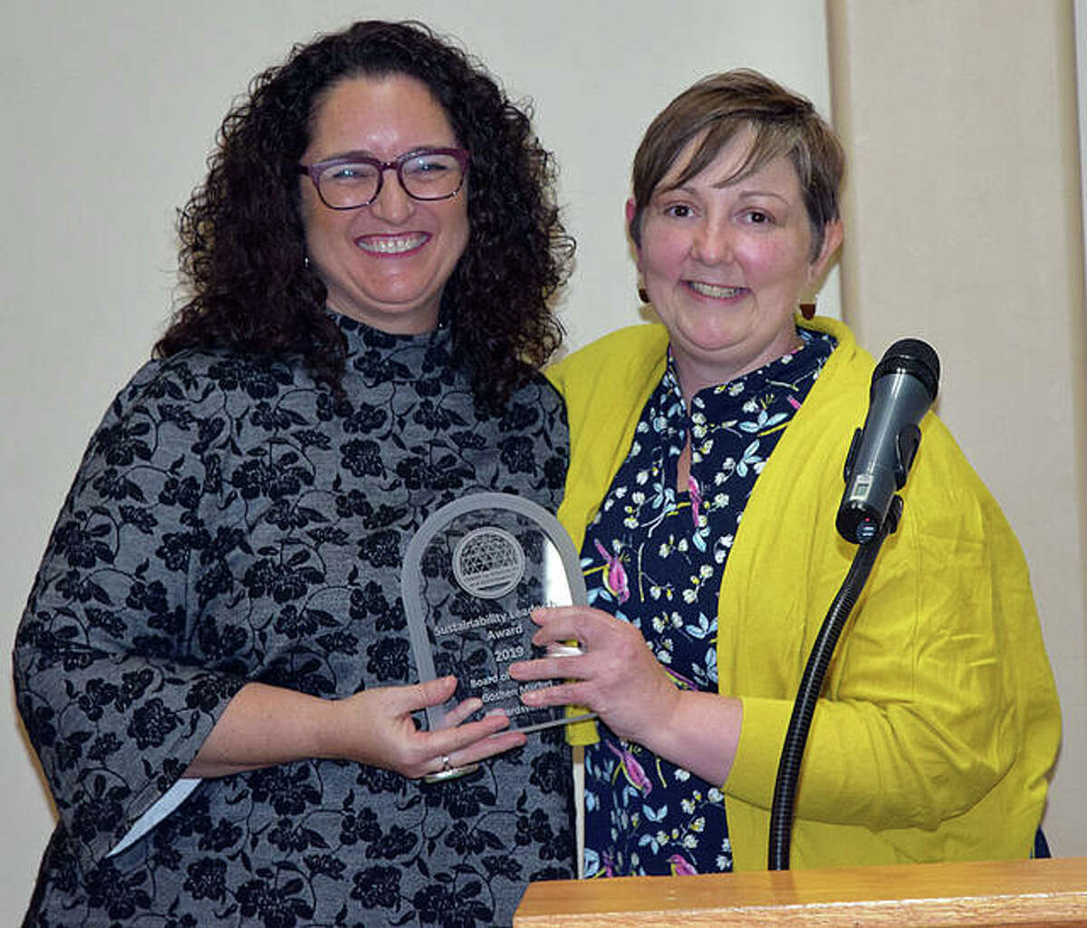 The Sustainability Leadership Award was presented to the Land of Goshen Community Market. Accepting the award on behalf of the Market is Sharon Henderson, left, Land of Goshen Community Market president. Jessica DeSpain, Goshen Market Foundation president, presented the award.