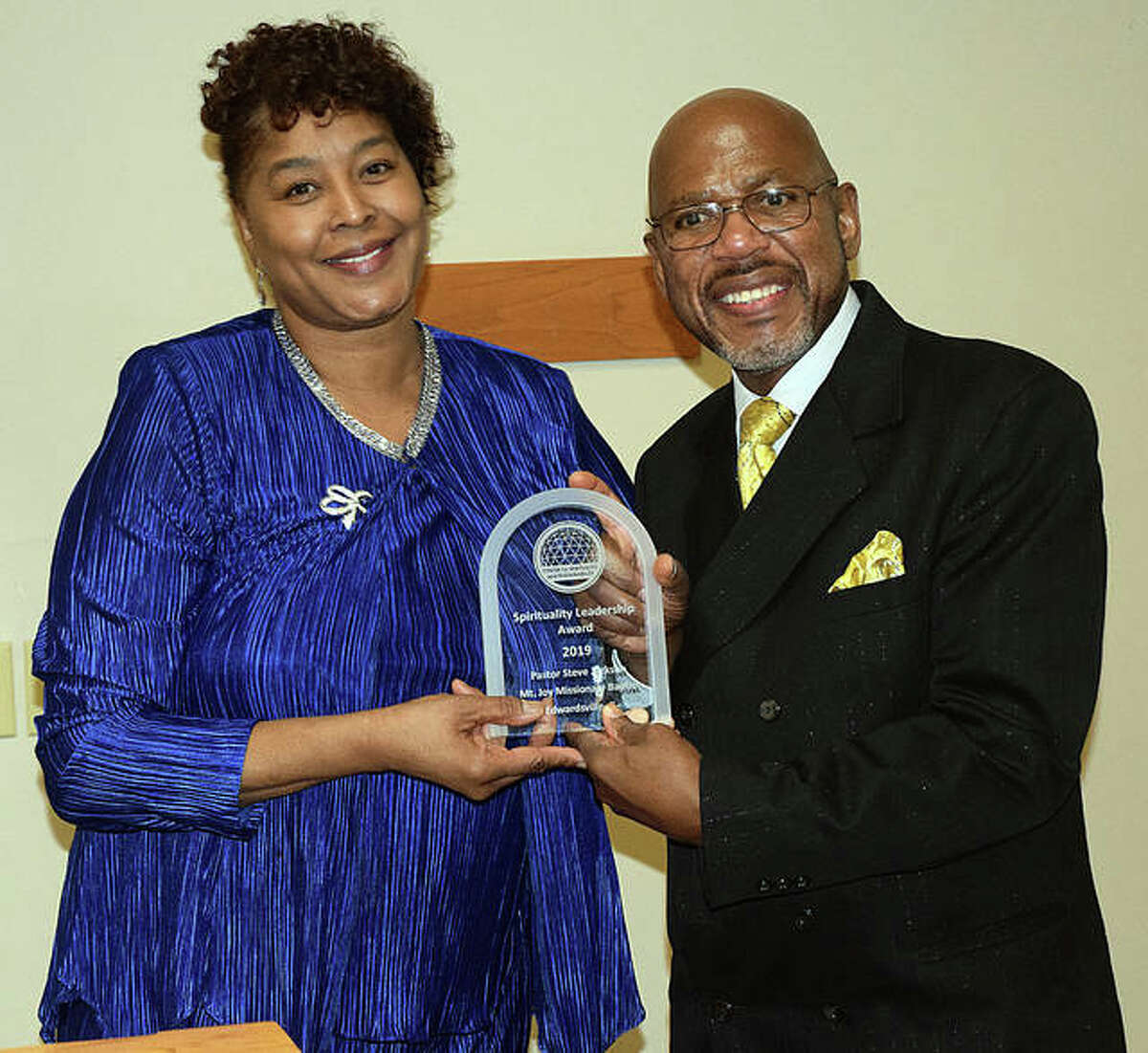 The Center for Spirituality and Sustainability held its 16th annual Leadership Awards Dinner at the Lewis and Clark N. O. Nelson campus on Saturday, March 30. The Spiritual Leadership Award was presented to Rev. Steven Jackson, right, of Edwardsville. Jackson is the minister of the Mt. Joy Missionary Baptist Church in Edwardsville. Dorcas Jackson, left, Center for Spirituality and Sustainability Board Member, presented the award.