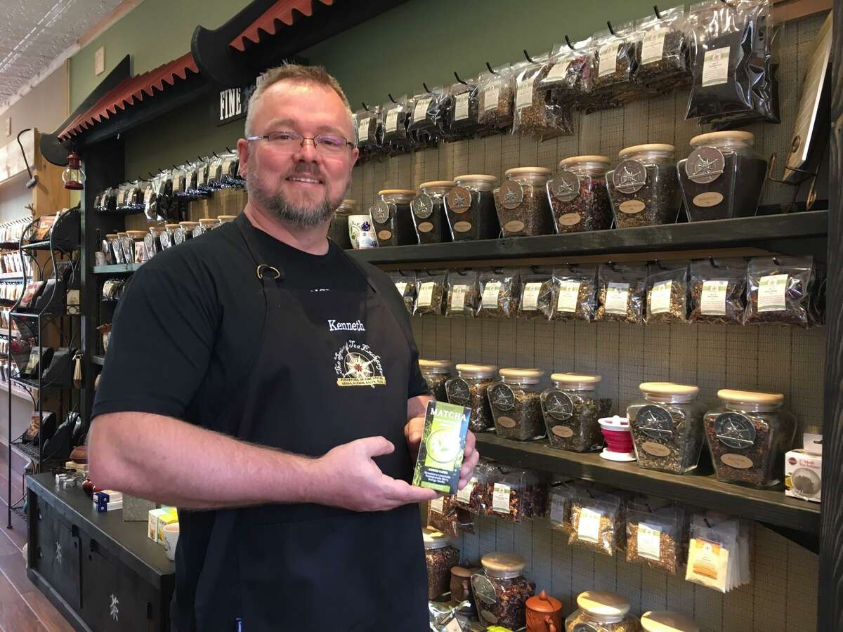 Kenneth Schneider, owner of The Spice & Tea Exchange, honed his tea skills during his four-year assignment in Alaska. The colder climate proved to be a good environment for drinking hot tea. It’s also where he and his wife, Jocelyn, first got introduced to the exchange. Here he holds a box of Matcha Japanese tea whose leaves can be eaten and not just steeped in hot water.
