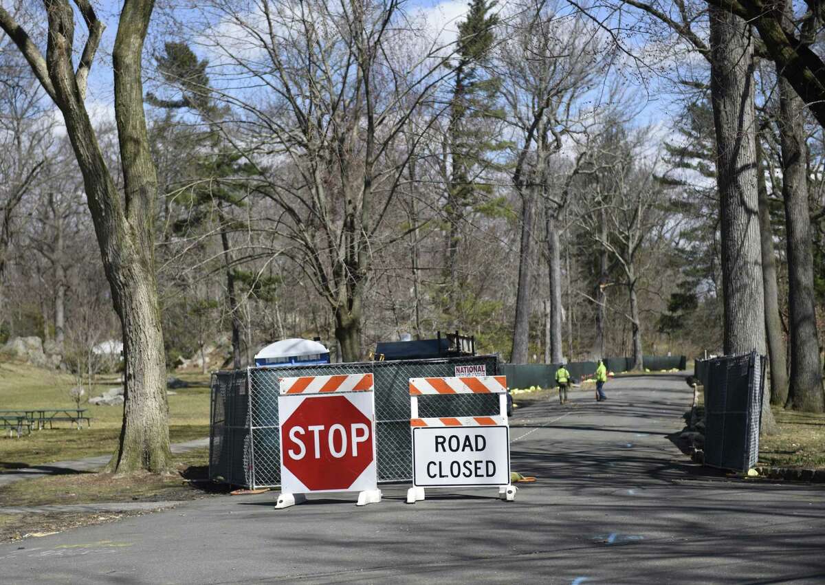 Construction crews close down Woods Road for construction at Bruce Park on Monday.