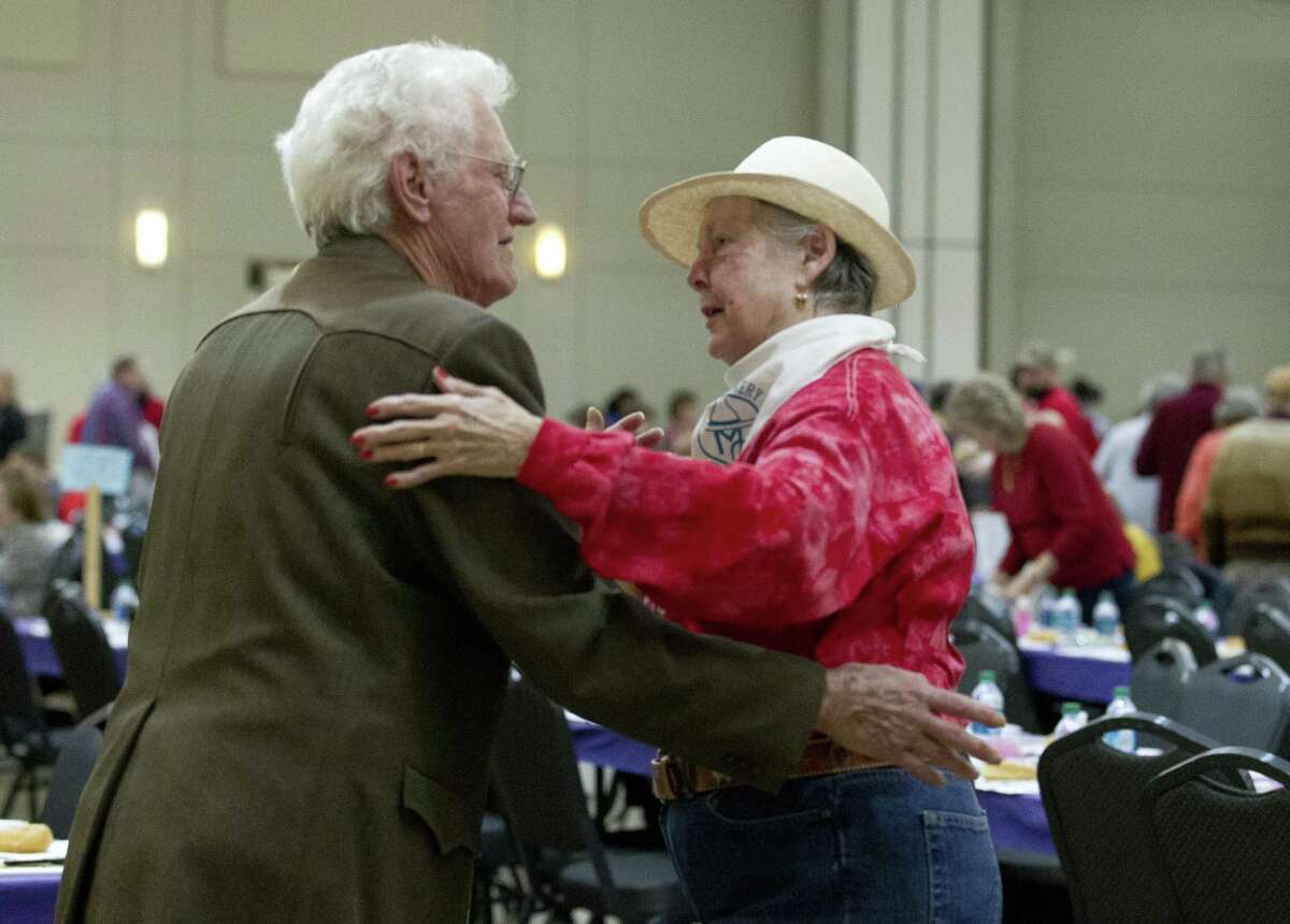 Virginia Burrell dances with her husband of 57 years, Jimmy, during senior citizens day at the Montgomery County Fair and Rodeo, Tuesday, April 2, 2019, in Conroe.